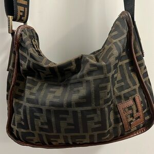 Authentic Vintage Fendi bag well loved. Crossbody strap adjustable